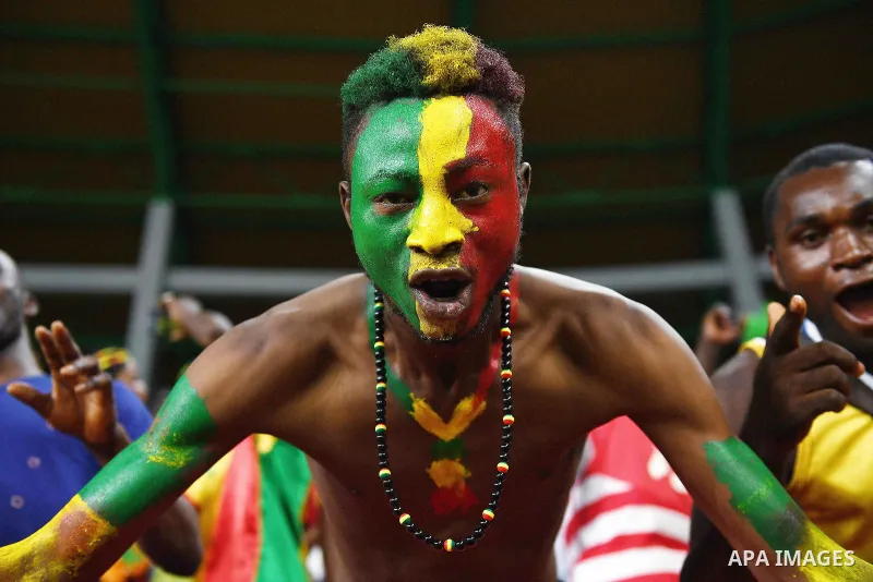 A Mali supporter cheers for his team ahead of the 2017 Africa Cup of Nations group D football match between Mali and Egypt in Port-Gentil on January 17, 2017. Photo by Stranger