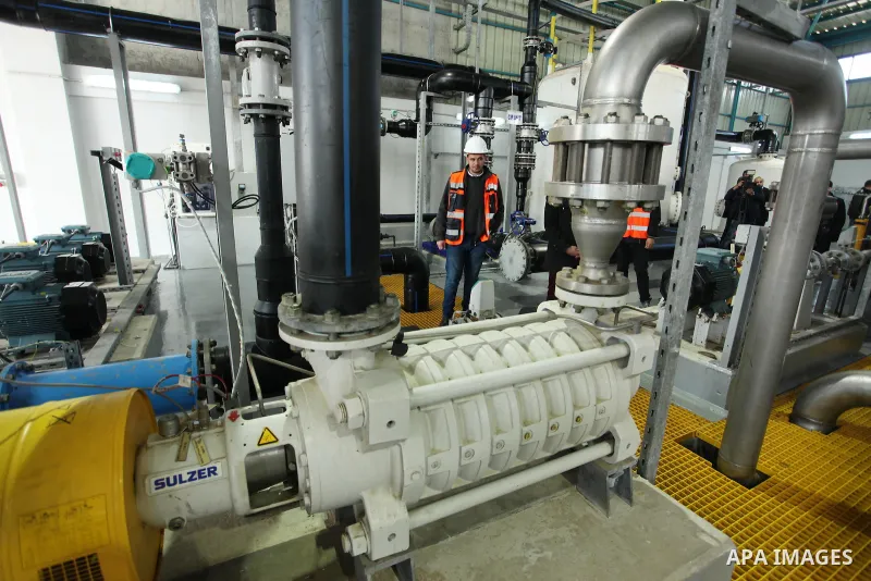 A Palestinian worker checks of pipes during the inauguration ceremony of The First Phase of the Seawater Desalination Plant-Southern Gaza completed with generous support from the European union Implemented by UNICEF in p...