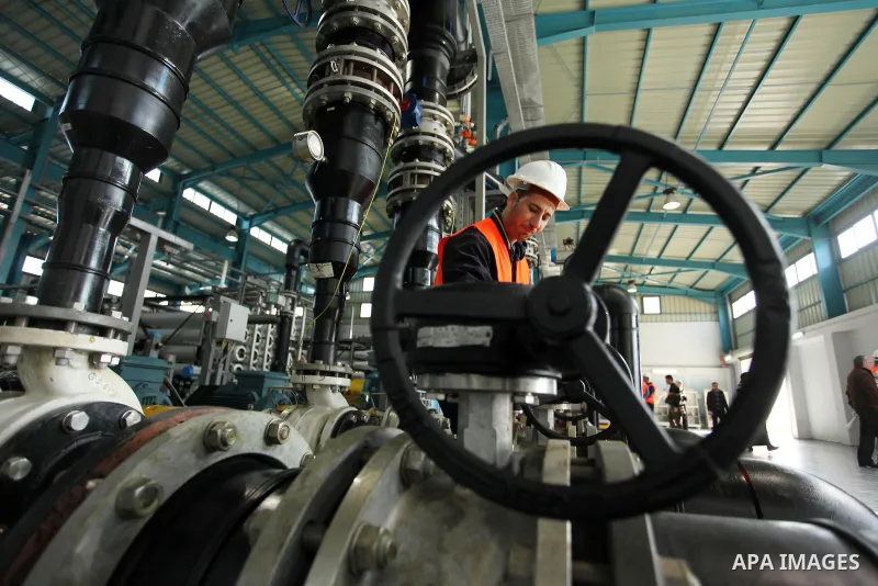 A Palestinian worker checks of pipes during the inauguration ceremony of The First Phase of the Seawater Desalination Plant-Southern Gaza completed with generous support from the European union Implemented by UNICEF in p...