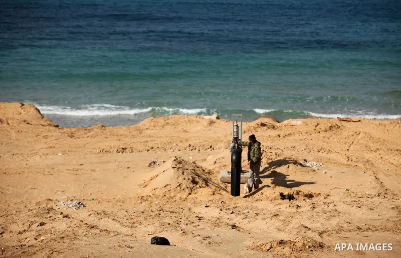 A Palestinian worker checks of pipes during the inauguration ceremony of The First Phase of the Seawater Desalination Plant-Southern Gaza completed with generous support from the European union Implemented by UNICEF in p...