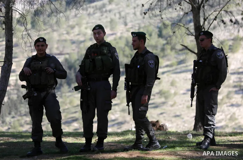 Israeli police take position during a demonstration against the construction of Jewish settlements in the occupied West Bank and against US President-elect Donald Trump, on January 20, 2017, near the settlement of Maale...