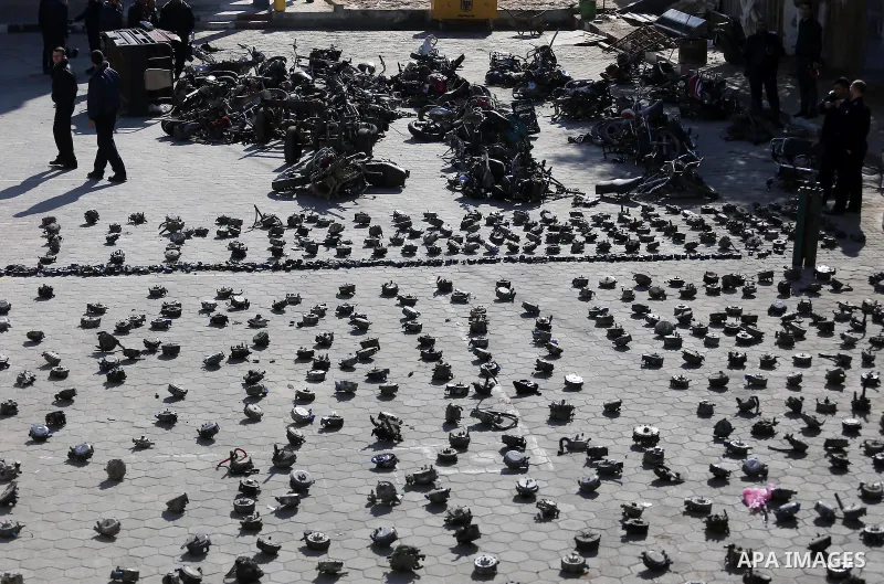 Palestinian policemen prepare illegal motorcycles and gas devices before destroy it in Gaza city on January 22, 2017. According to Palestinian traffic police more than 70 motorcycle and 1500 Gas device will be destroyed....