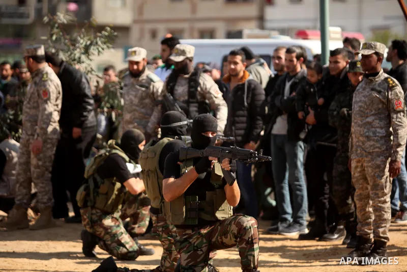 Members of Palestinian National Security Forces loyal to Hamas demonstrate their skills during a military graduation ceremony, in Gaza City January 22, 2017. Photo by Ashraf Amra