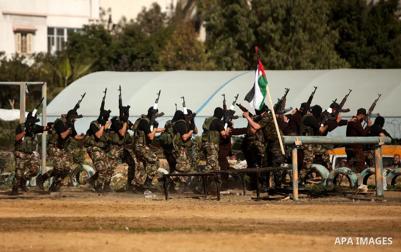 Members of Palestinian National Security Forces loyal to Hamas demonstrate their skills during a military graduation ceremony, in Gaza City January 22, 2017. Photo by Ashraf Amra