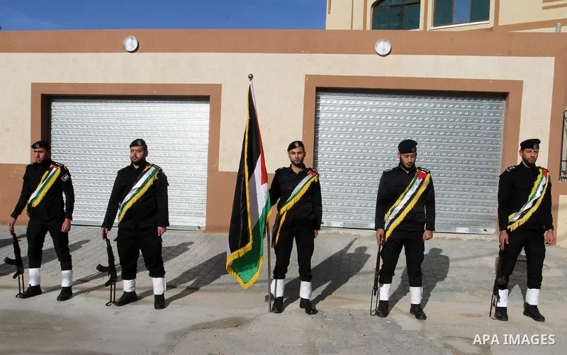 Palestinian policemen attend the opening ceremony of the detectives and control headquarters and police women, in Rafah in the southern Gaza strip, on January 23, 2017. Photo by Abed Rahim Khatib