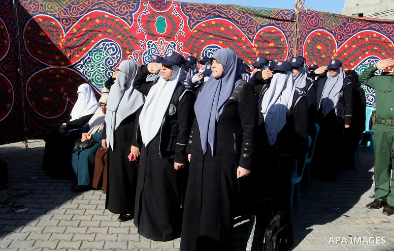 Palestinian policemen attend the opening ceremony of the detectives and control headquarters and police women, in Rafah in the southern Gaza strip, on January 23, 2017. Photo by Abed Rahim Khatib