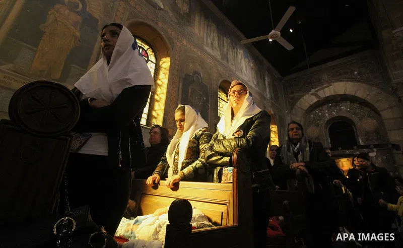 Egyptian Christians take part in a prayer at the the Saint Peter, mourn of the victims of a bomb explosion that targeted a Coptic Orthodox Church on December 11, 2016, on January 22, 2017 . The blast killed at least 25 w...