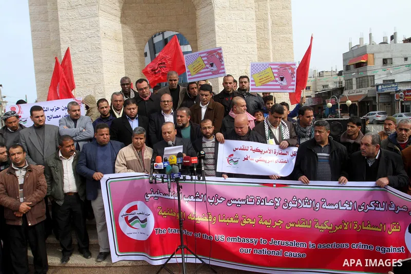 Palestinian protestors take part in a demonstration against US President Donald Trump's pledge to move his country's embassy to Jerusalem, in Rafah in the southern Gaza Strip on January 24, 2017. Trump has pledged strong...