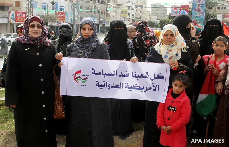 Palestinian protestors take part in a demonstration against US President Donald Trump's pledge to move his country's embassy to Jerusalem, in Rafah in the southern Gaza Strip on January 24, 2017. Trump has pledged strong...