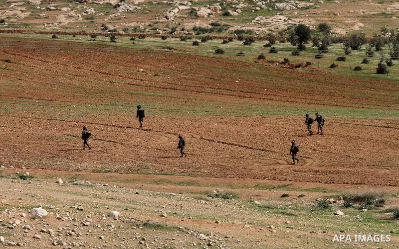 Israeli soldiers take part in a military training near Jeftlek village near Jordan Valley in the West Bank, on January 24, 2017. Photo by Nedal Eshtayah
