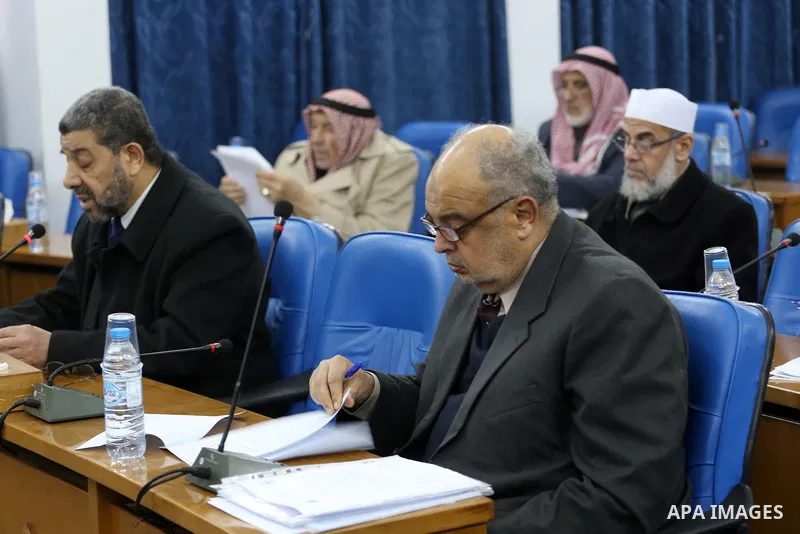 Members of the Palestinian legislative council from Hamas movement attend a meeting at the legislative council in Gaza city on January 25, 2017. Photo by Mohammed Asad