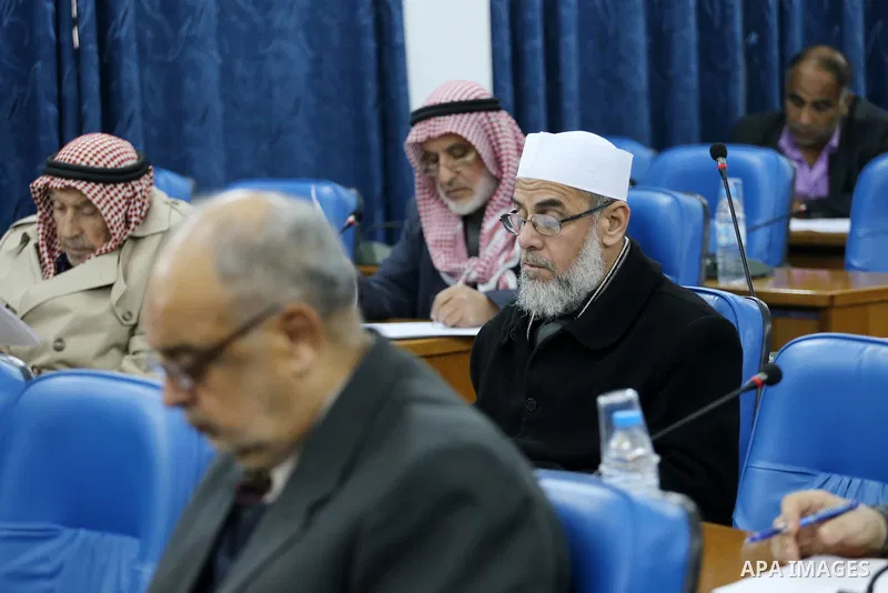 Members of the Palestinian legislative council from Hamas movement attend a meeting at the legislative council in Gaza city on January 25, 2017. Photo by Mohammed Asad