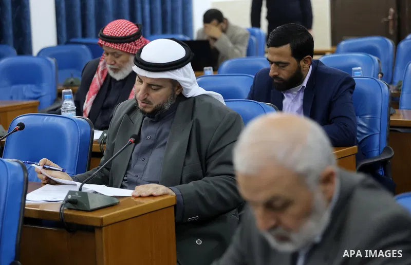 Members of the Palestinian legislative council from Hamas movement attend a meeting at the legislative council in Gaza city on January 25, 2017. Photo by Mohammed Asad