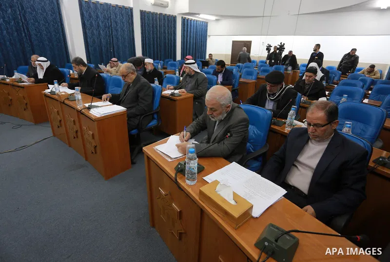 Members of the Palestinian legislative council from Hamas movement attend a meeting at the legislative council in Gaza city on January 25, 2017. Photo by Mohammed Asad