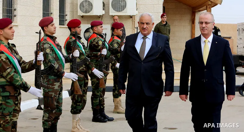 Palestinian Prime Minister Rami Hamdallah arrives to attend the second annual security conference, in the West Bank city of Jericho, on January 25, 2017. Photo by Prime Minister Office