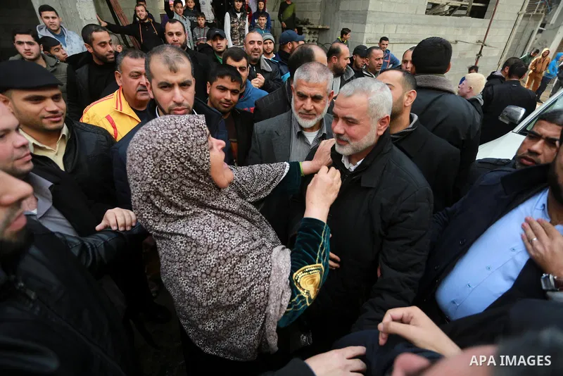 Hamas leader Ismail Haniya is greeted by supporters upon his return to Gaza City after performing the Hajj pilgrimage, at al-Shati refugee camp in Gaza City on January 27, 2017. Photo by Mohammed Asad