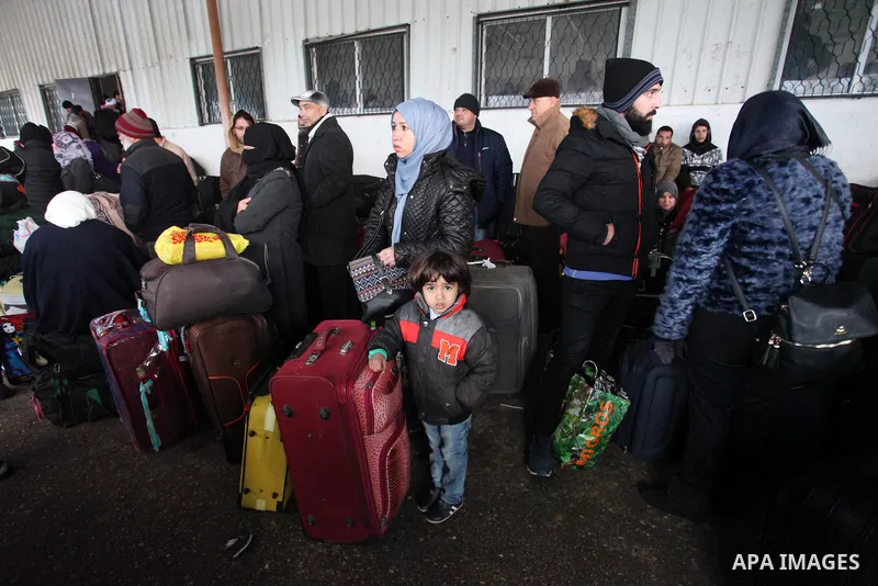 Palestinians wait for travel permits to cross into Egypt through the Rafah border crossing after it was opened by Egyptian authorities for humanitarian cases, in Rafah in the southern Gaza Strip January 28, 2017. Photo b...