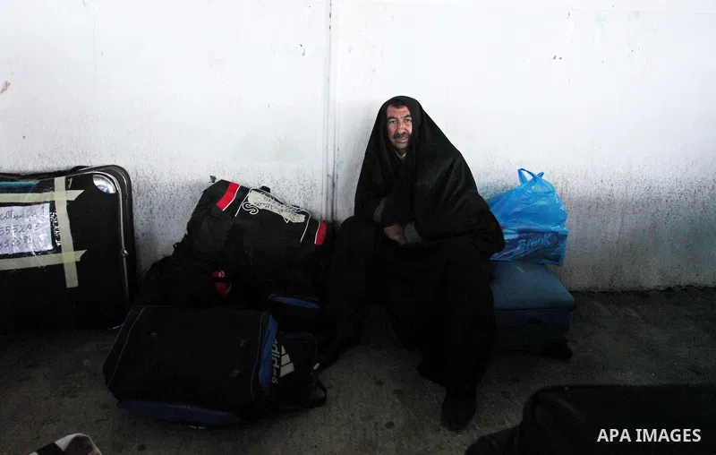 Palestinians wait for travel permits to cross into Egypt through the Rafah border crossing after it was opened by Egyptian authorities for humanitarian cases, in Rafah in the southern Gaza Strip January 28, 2017. Photo b...
