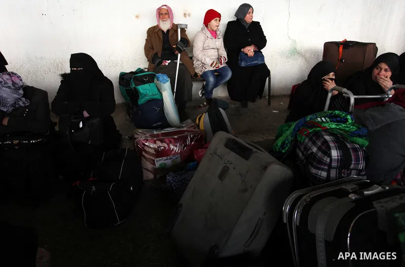 Palestinians wait for travel permits to cross into Egypt through the Rafah border crossing after it was opened by Egyptian authorities for humanitarian cases, in Rafah in the southern Gaza Strip January 28, 2017. Photo b...