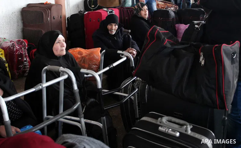 Palestinians wait for travel permits to cross into Egypt through the Rafah border crossing after it was opened by Egyptian authorities for humanitarian cases, in Rafah in the southern Gaza Strip January 28, 2017. Photo b...