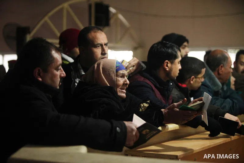 Palestinians wait for travel permits to cross into Egypt through the Rafah border crossing after it was opened by Egyptian authorities for humanitarian cases, in Rafah in the southern Gaza Strip January 28, 2017. Photo b...