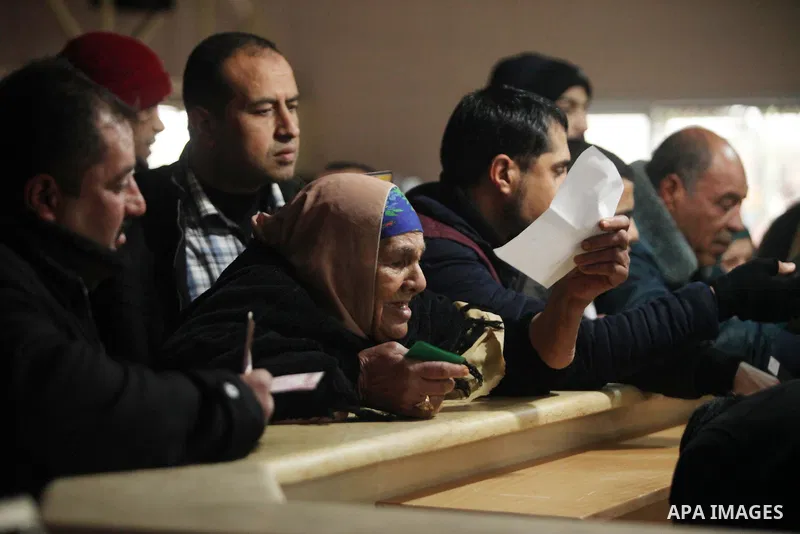 Palestinians wait for travel permits to cross into Egypt through the Rafah border crossing after it was opened by Egyptian authorities for humanitarian cases, in Rafah in the southern Gaza Strip January 28, 2017. Photo b...