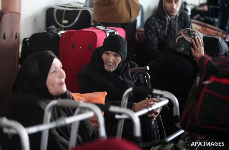 Palestinians wait for travel permits to cross into Egypt through the Rafah border crossing after it was opened by Egyptian authorities for humanitarian cases, in Rafah in the southern Gaza Strip January 28, 2017. Photo b...