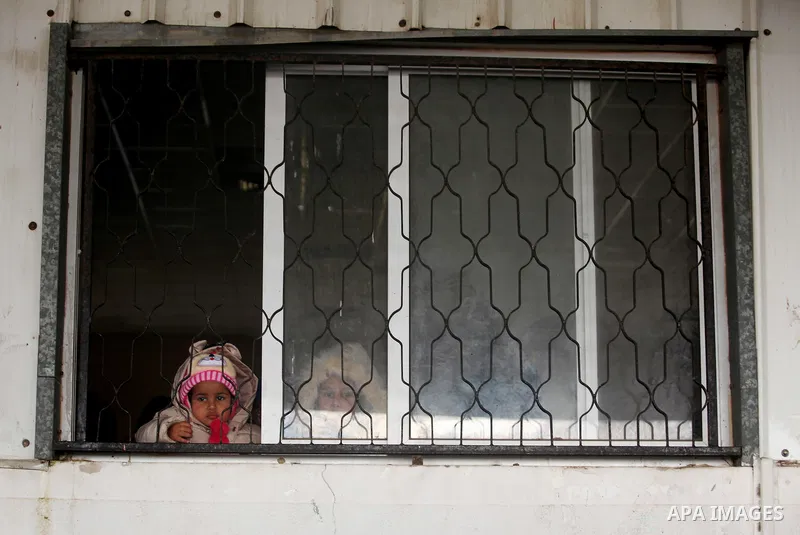Palestinians wait for travel permits to cross into Egypt through the Rafah border crossing after it was opened by Egyptian authorities for humanitarian cases, in Rafah in the southern Gaza Strip January 28, 2017. Photo b...