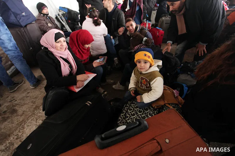 Palestinians wait for travel permits to cross into Egypt through the Rafah border crossing after it was opened by Egyptian authorities for humanitarian cases, in Rafah in the southern Gaza Strip January 28, 2017. Photo b...