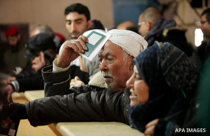 Palestinians wait for travel permits to cross into Egypt through the Rafah border crossing after it was opened by Egyptian authorities for humanitarian cases, in Rafah in the southern Gaza Strip January 28, 2017. Photo b...