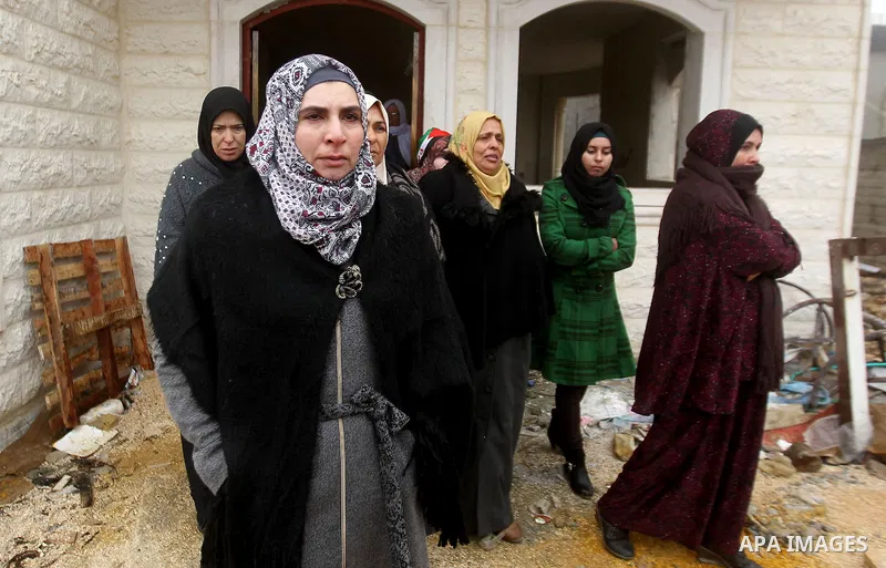 Fatima, the mother of Majd al-Khudur, a Palestinian woman who was killed by Israeli security forces during a car-ramming attack last year, attends the funeral of her daughter in the West Bank village of Bani Naim near He...