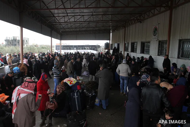 Palestinians wait for travel permits to cross into Egypt through the Rafah border crossing after it was opened by Egyptian authorities for humanitarian cases, in Rafah in the southern Gaza Strip, on January 29, 2017. Pho...