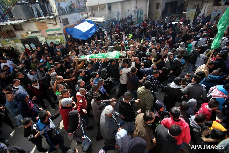 Mourners carry the body of Palestinian Mohammed Abu Khalifa, during his funeral at the Jenin refugee camp, near the West Bank city of Jenin, on January 29, 2017. A Palestinian was shot dead and five others were wounded b...