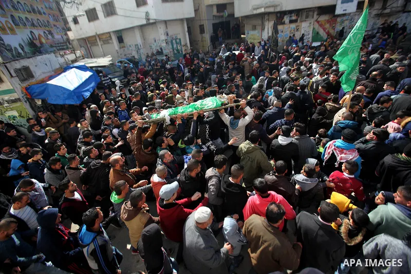 Mourners carry the body of Palestinian Mohammed Abu Khalifa, during his funeral at the Jenin refugee camp, near the West Bank city of Jenin, on January 29, 2017. A Palestinian was shot dead and five others were wounded b...