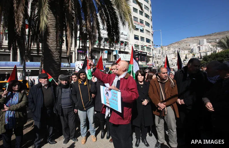Palestinians take part during a protest to show solidarity with Palestinian in Bedouin village of Umm al-Hiran, in the West Bank city of Nablus, on January 30, 2017. Photo by Nedal Eshtayah