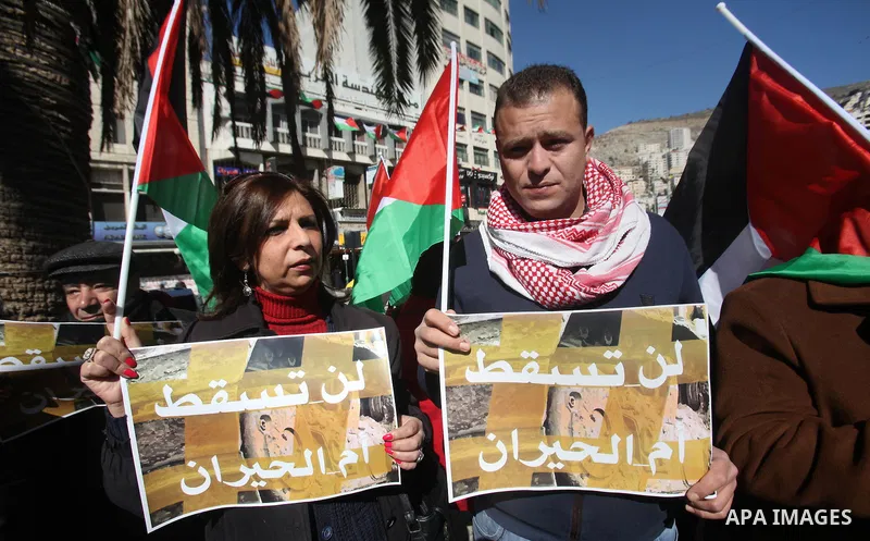 Palestinians take part during a protest to show solidarity with Palestinian in Bedouin village of Umm al-Hiran, in the West Bank city of Nablus, on January 30, 2017. Photo by Nedal Eshtayah