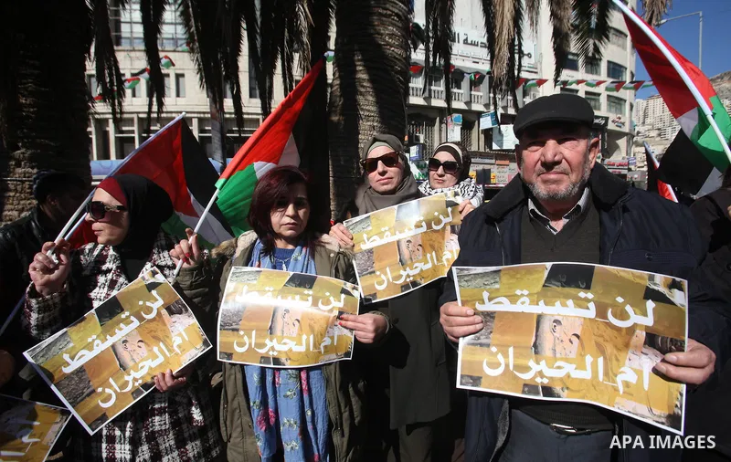Palestinians take part during a protest to show solidarity with Palestinian in Bedouin village of Umm al-Hiran, in the West Bank city of Nablus, on January 30, 2017. Photo by Nedal Eshtayah