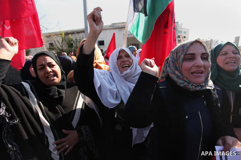 Palestinian supporters of the Democratic Front for the Liberation of Palestine (DFLP) take part during a protest to show solidarity with Palestinian in Bedouin village of Umm al-Hiran, in front of United Nation headquart...