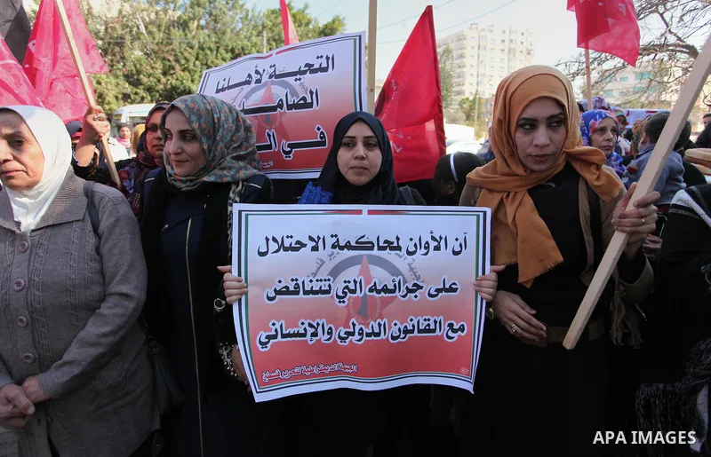 Palestinian supporters of the Democratic Front for the Liberation of Palestine (DFLP) take part during a protest to show solidarity with Palestinian in Bedouin village of Umm al-Hiran, in front of United Nation headquart...