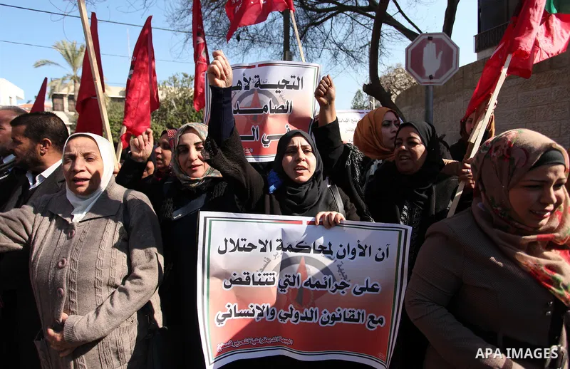 Palestinian supporters of the Democratic Front for the Liberation of Palestine (DFLP) take part during a protest to show solidarity with Palestinian in Bedouin village of Umm al-Hiran, in front of United Nation headquart...
