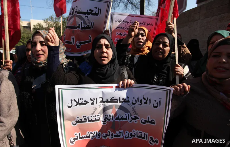 Palestinian supporters of the Democratic Front for the Liberation of Palestine (DFLP) take part during a protest to show solidarity with Palestinian in Bedouin village of Umm al-Hiran, in front of United Nation headquart...