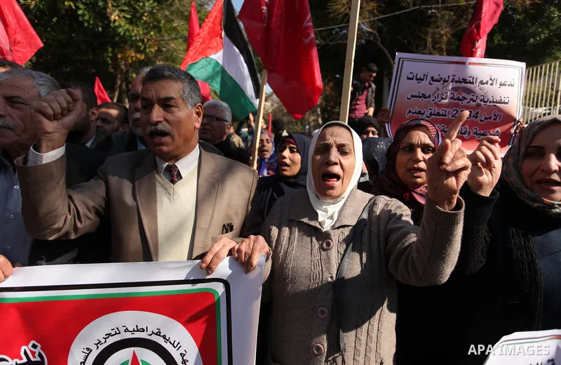Palestinian supporters of the Democratic Front for the Liberation of Palestine (DFLP) take part during a protest to show solidarity with Palestinian in Bedouin village of Umm al-Hiran, in front of United Nation headquart...