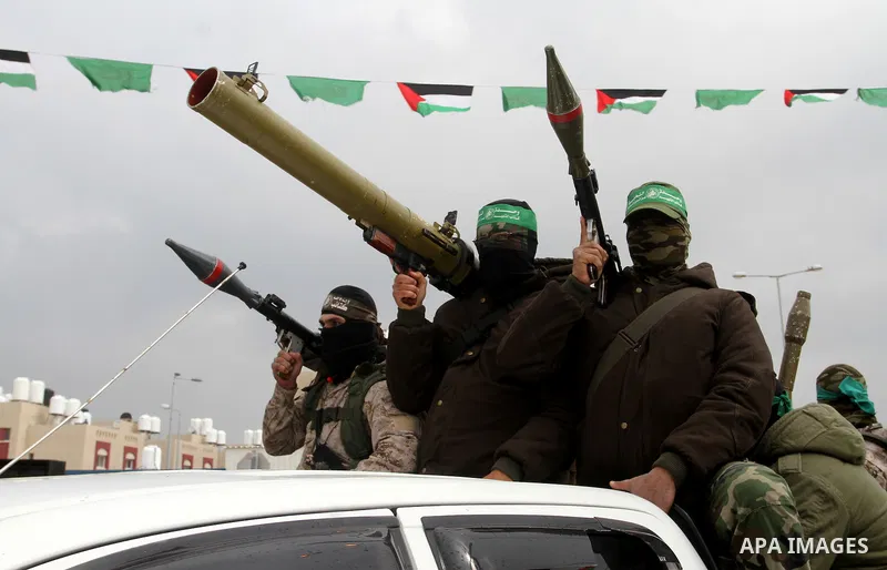 Members of the Ezzedine al-Qassam Brigades, the military wing of the Palestinian Islamist movement Hamas, attend a memorial in Rafah in the southern Gaza Strip on January 31, 2017, for Mohamed Zouari, a 49-year-old Tunis...