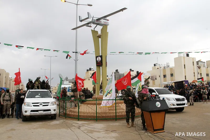 Abu Ubaida, spokesman of the Ezzedine al-Qassam Brigades, the military wing of the Palestinian Islamist movement Hamas, speaks during a memorial in Rafah in the southern Gaza Strip on January 31, 2017, for Mohamed Zouari...