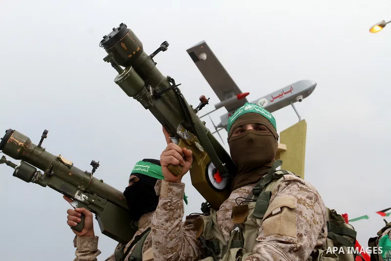 Members of the Ezzedine al-Qassam Brigades, the military wing of the Palestinian Islamist movement Hamas, attend a memorial in Rafah in the southern Gaza Strip on January 31, 2017, for Mohamed Zouari, a 49-year-old Tunis...