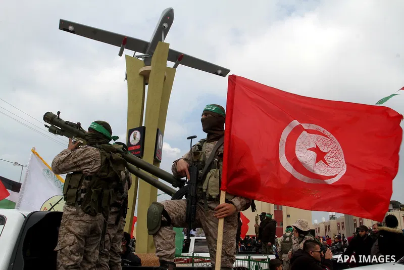 Members of the Ezzedine al-Qassam Brigades, the military wing of the Palestinian Islamist movement Hamas, attend a memorial in Rafah in the southern Gaza Strip on January 31, 2017, for Mohamed Zouari, a 49-year-old Tunis...