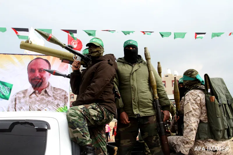 Members of the Ezzedine al-Qassam Brigades, the military wing of the Palestinian Islamist movement Hamas, attend a memorial in Rafah in the southern Gaza Strip on January 31, 2017, for Mohamed Zouari, a 49-year-old Tunis...
