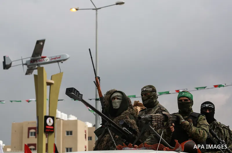 Members of the Ezzedine al-Qassam Brigades, the military wing of the Palestinian Islamist movement Hamas, attend a memorial in Rafah in the southern Gaza Strip on January 31, 2017, for Mohamed Zouari, a 49-year-old Tunis...