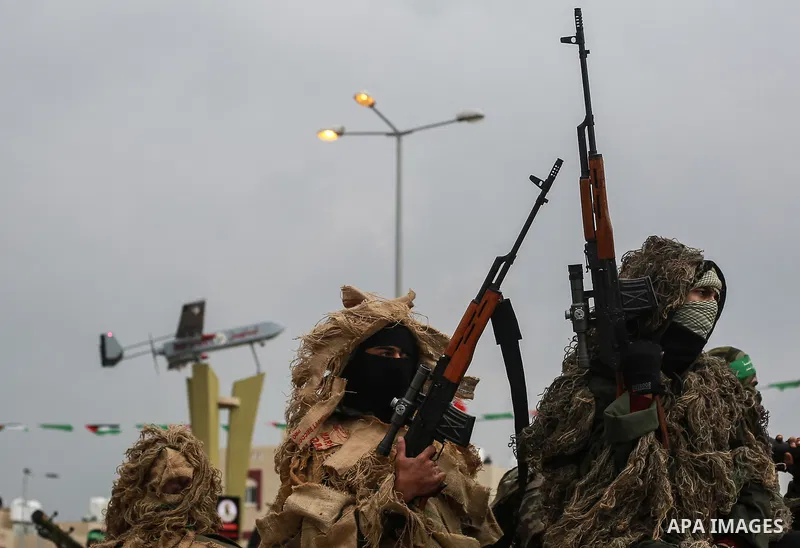Members of the Ezzedine al-Qassam Brigades, the military wing of the Palestinian Islamist movement Hamas, attend a memorial in Rafah in the southern Gaza Strip on January 31, 2017, for Mohamed Zouari, a 49-year-old Tunis...