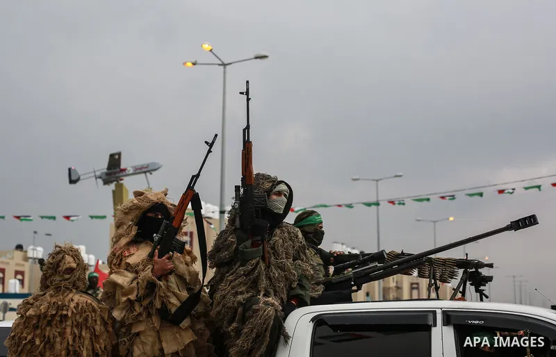 Members of the Ezzedine al-Qassam Brigades, the military wing of the Palestinian Islamist movement Hamas, attend a memorial in Rafah in the southern Gaza Strip on January 31, 2017, for Mohamed Zouari, a 49-year-old Tunis...
